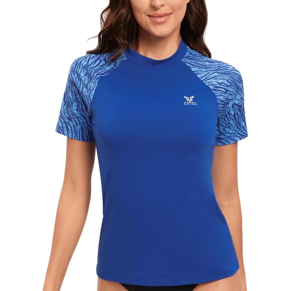 imageHUGE SPORTS Womens UPF 50 UV Protection Sun Shirts Short Sleeve Quick Dry Rash Guard Swim Gym Workout TopsBlue